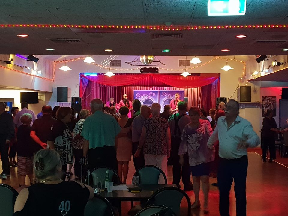 Chairs, tables and dancers at the British Working Men's Club, Wingfield