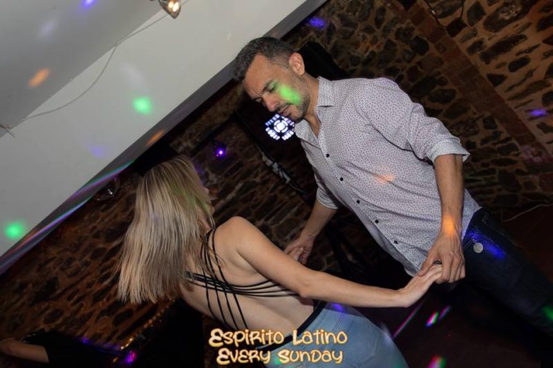 man and lady dance salsa